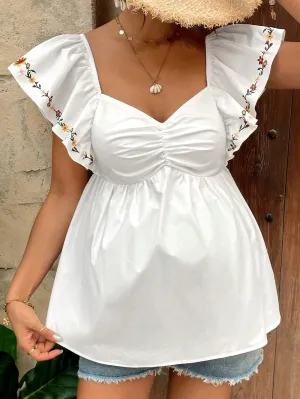 Cherry Vibes: Camisa con Lazo y Bordado Floral para Embarazadas