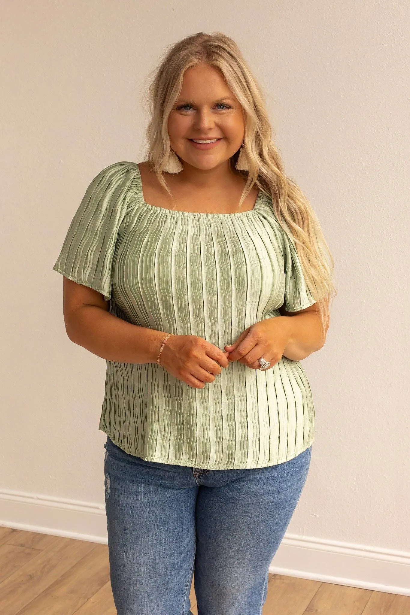 Green short sleeve silk top