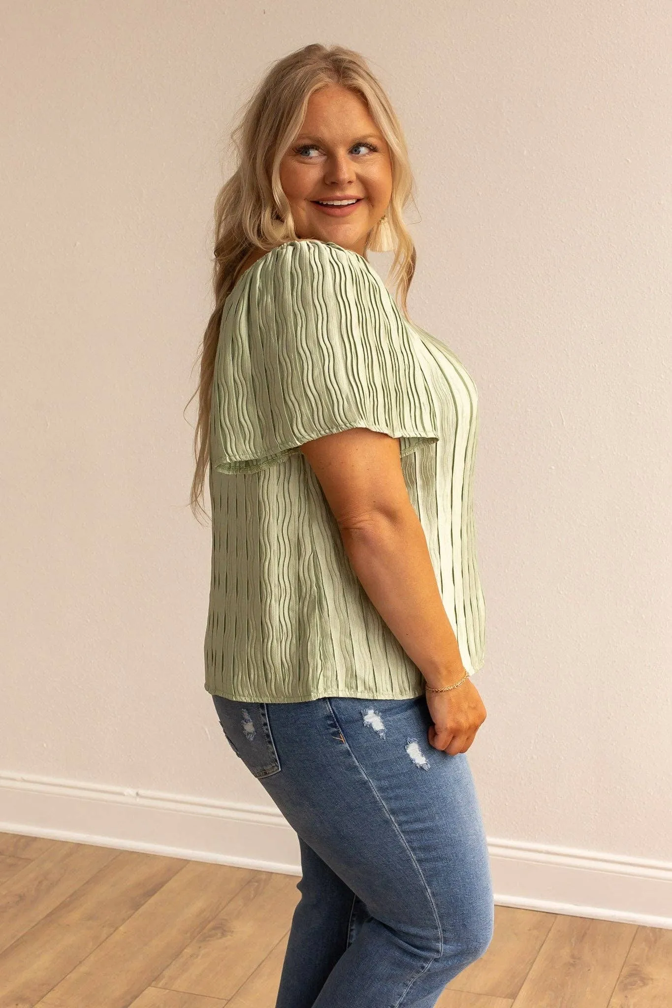 Green short sleeve silk top