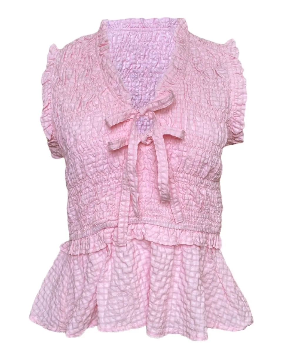 Textured Sleeveless Peplum Smocked Top In Light Pink