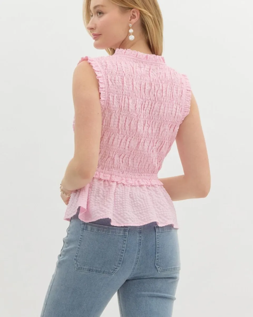 Textured Sleeveless Peplum Smocked Top In Light Pink