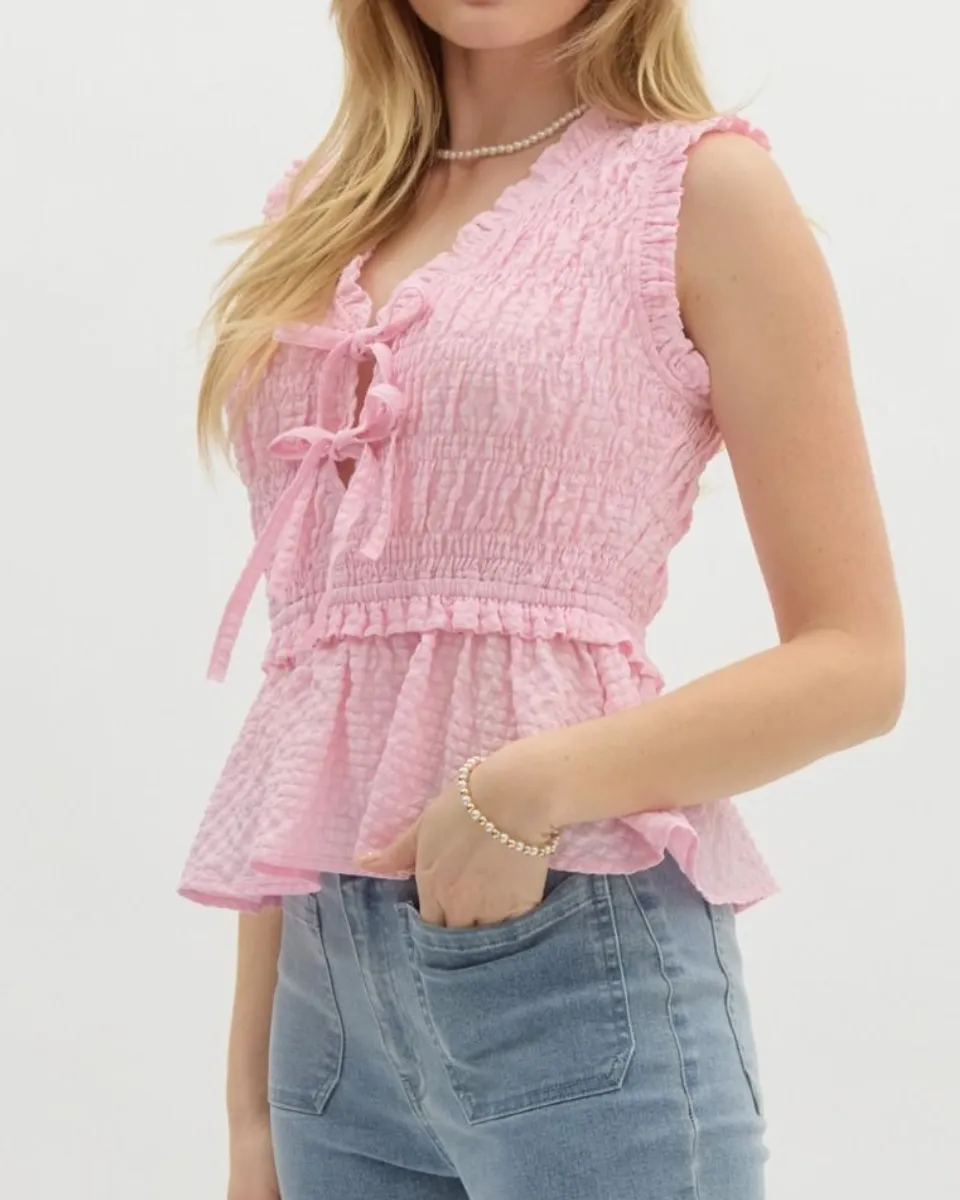 Textured Sleeveless Peplum Smocked Top In Light Pink