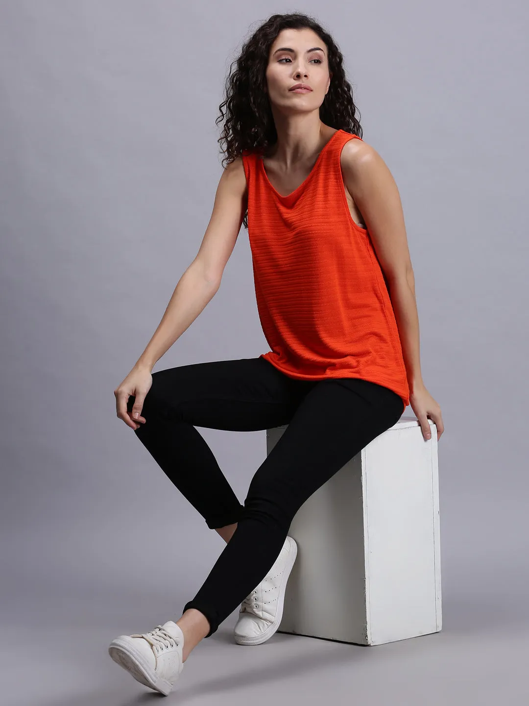 Women Solid Orange Sleeveless Tank Tops